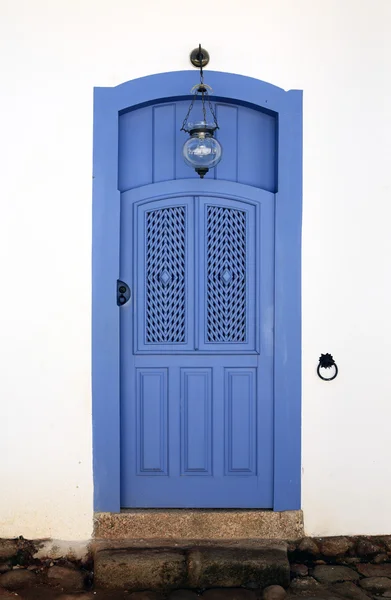 Blue colorful front house door in parati brazil — Stock Photo, Image