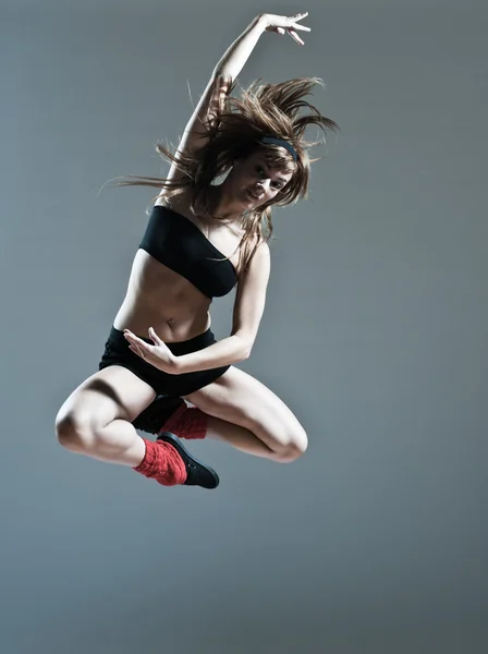 Beautiful young woman leap jump — Stock Photo, Image