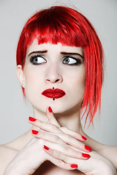 Funny & sexy expressive redhead girl Stock Photo