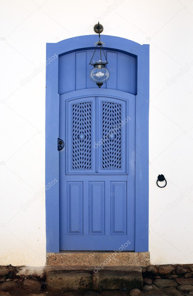 Blue colorful front house door in parati brazil