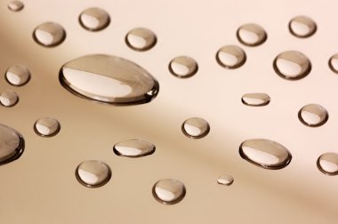 Transparent droplets on the mirror surface clipart