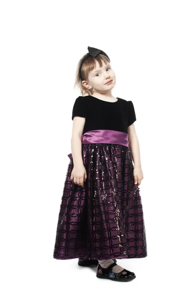 Schattig meisje in een jurk — Stockfoto