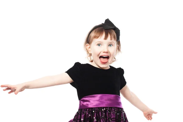Glada rop flicka i en klänning — Stockfoto