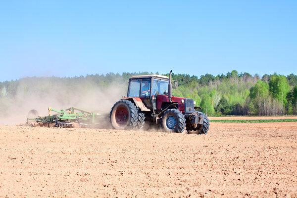 Ploughing tractor