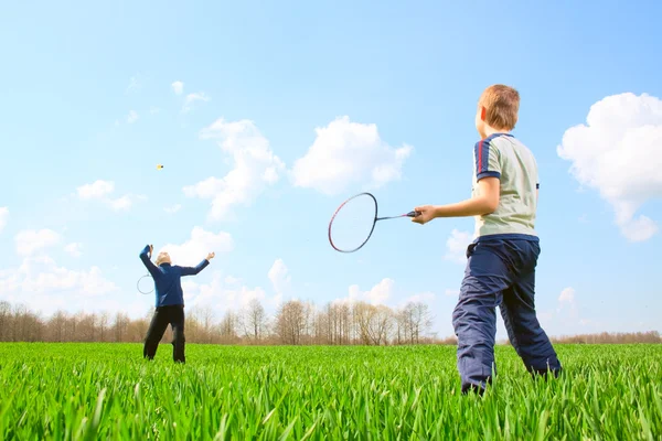 Stock image Family - two little boys playing badminton