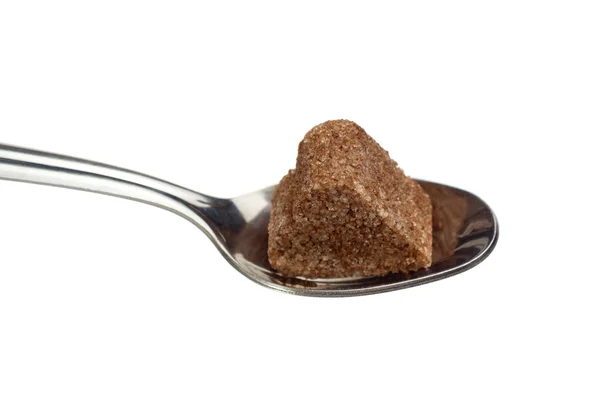 Cinnamon sugar in form of heart on spoon — Stock Photo, Image