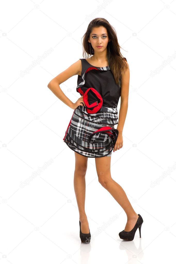 Portrait of a stunning young woman in designer short dress