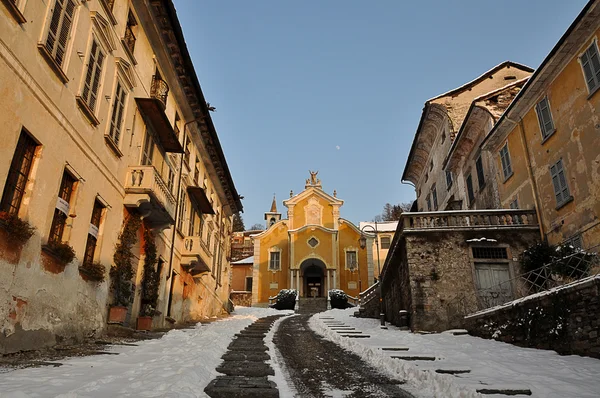 stock image The amazing church of Orta St. Julian after a snowfall