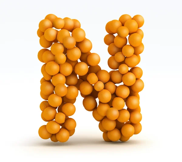Litery n, czcionki pomarańczowe owoce cytrusowe, białe tło — Zdjęcie stockowe