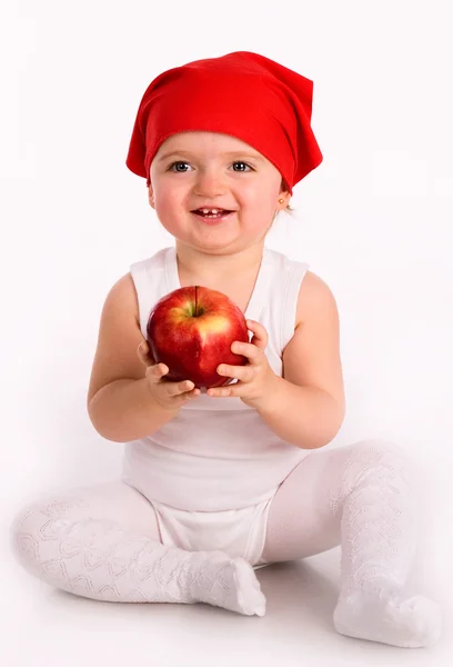 Bonita niñita. Primer plano en el estudio con manzana — Foto de Stock