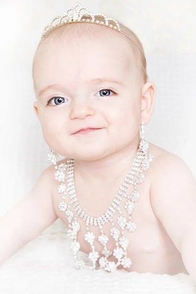 Little cute baby with jewelry Stock Image