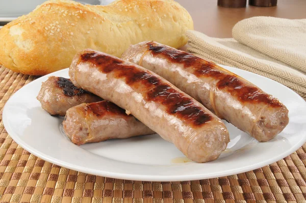Plate of grilled brats — Stock Photo, Image