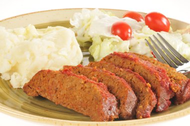 Closeup of meatloaf dinner clipart