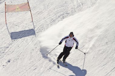 Skier in a winter landscape clipart
