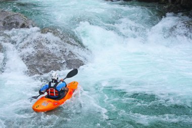 Man with a kayak clipart