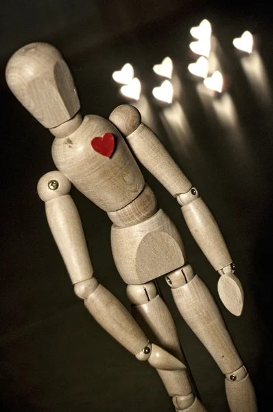 Mannequin with lights at heart — Stock Photo, Image