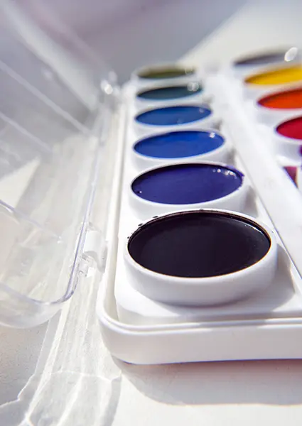 Colorful palette of watercolors . paints box on grey — Stock Photo, Image