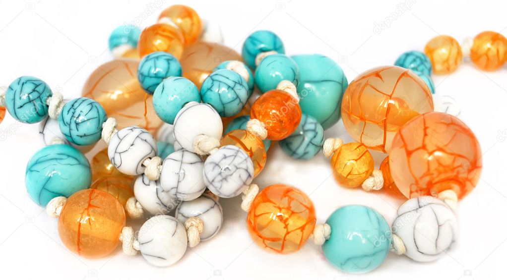 Colorful spring beads isolated on white