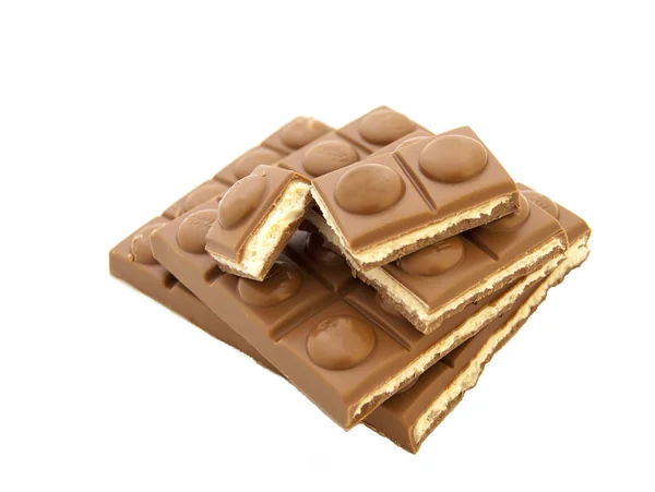 Chocolate pieces on white — Stock Photo, Image