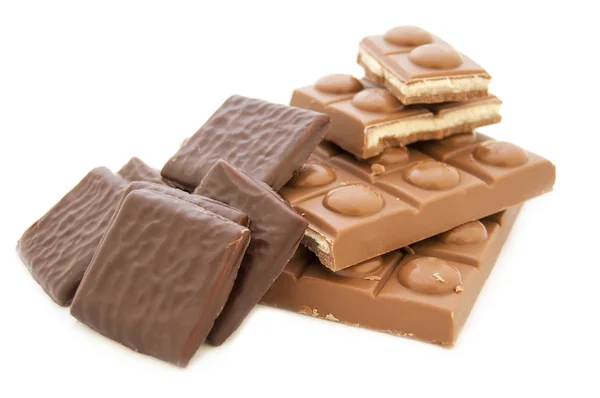 Kolekce lahodné čokolády izolovaných na bílém pozadí — Stock fotografie