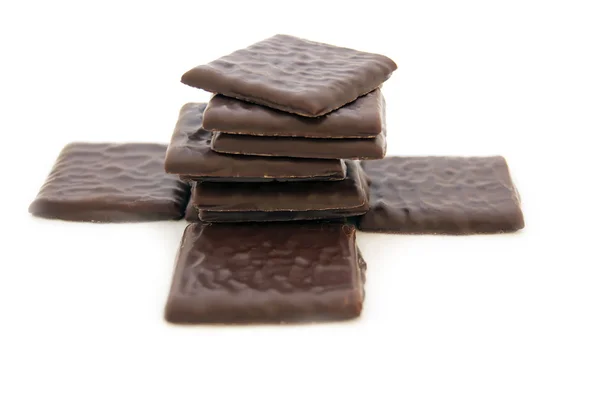 Trozos de chocolate sobre blanco — Foto de Stock