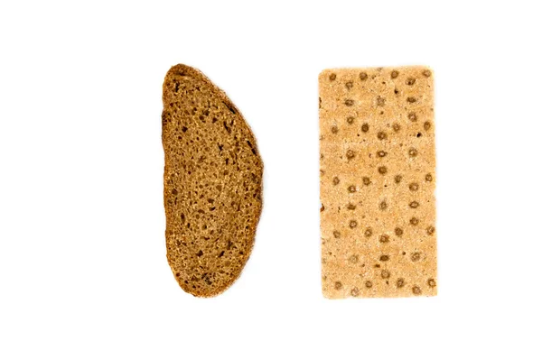 Brown bread and cracker over white background — Stock Photo, Image