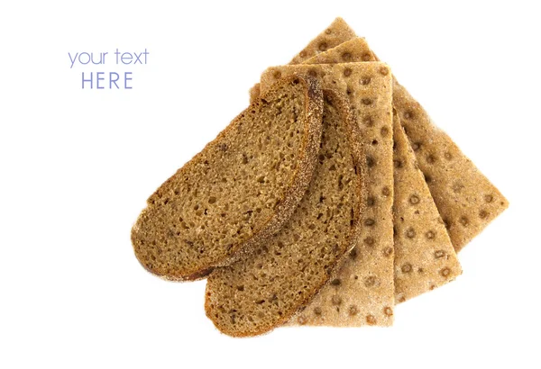 Drei braune Cracker und braunes Brot auf weißem Hintergrund, Diät — Stockfoto