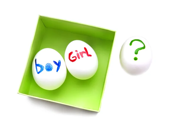 stock image Egg with baby girl and boy on white background