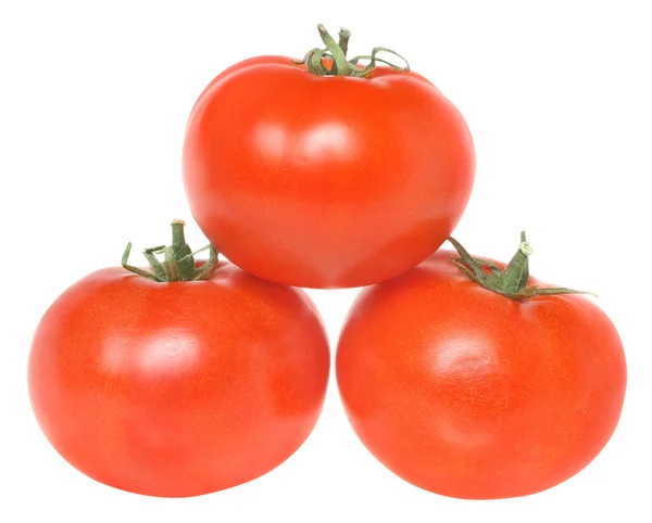 Three tomatoes isolated. — Stock Photo, Image