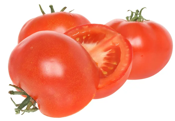 Dois tomates inteiros e um fatiado — Fotografia de Stock