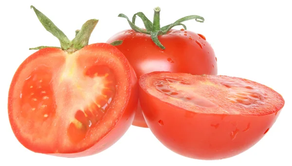 Volle Tomate und halbiert — Stockfoto