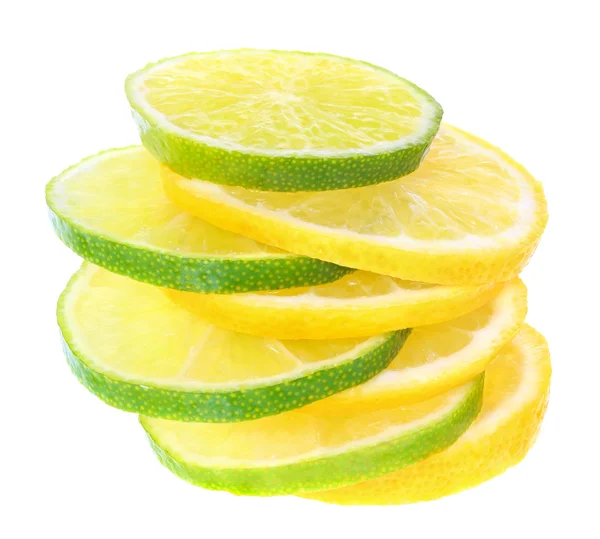 Нарізані ліміти та лимони . — стокове фото