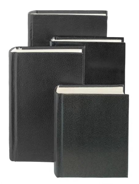 stock image Four black book facing each other