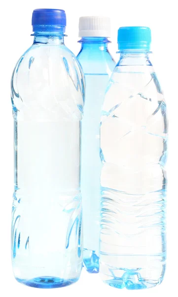 Три бутылки с водой — стоковое фото