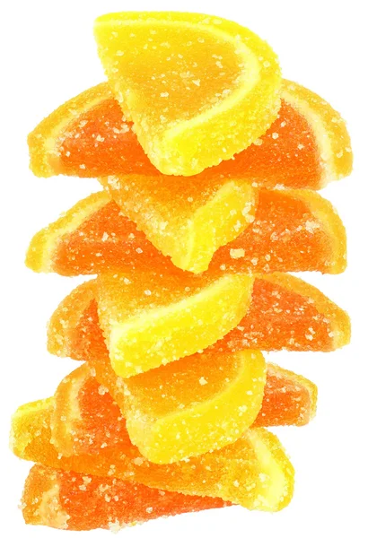 Turm orange und gelbe Fruchtbonbons isoliert — Stockfoto