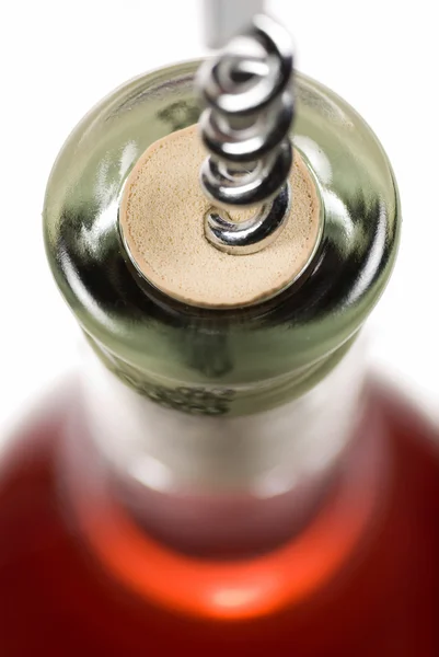 stock image Opening a bottle of red