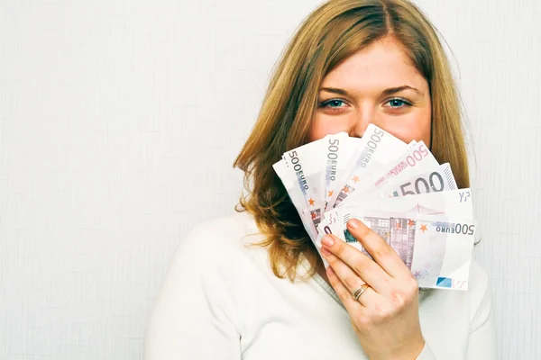 Γυναίκα με χρήματα σε άσπρο φόντο — Φωτογραφία Αρχείου