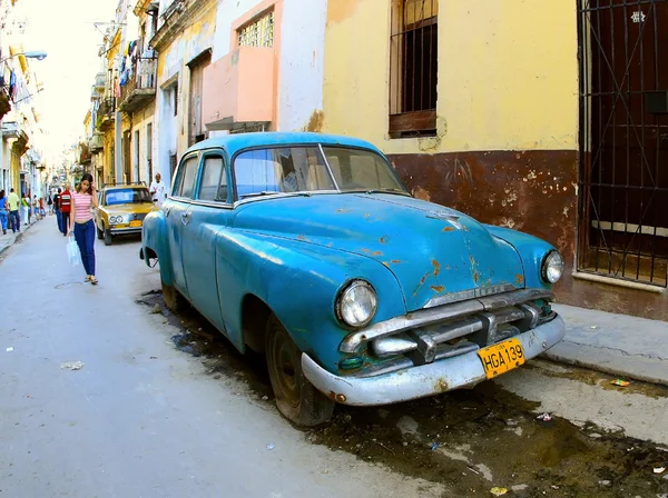 A classic old car is blue color