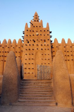 Front gate and minaret on Djenne mosque clipart