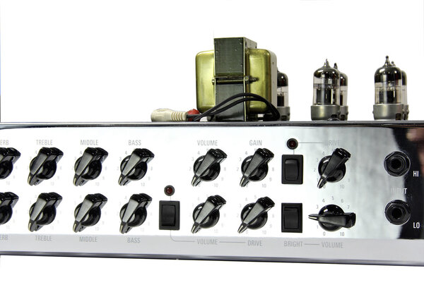Vintage style amplifier with glass vacuum tube . Control panel . Isolated with clipping path .