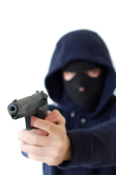 Ladrão apontando uma arma — Fotografia de Stock