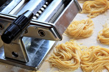 Manual pasta maker clipart