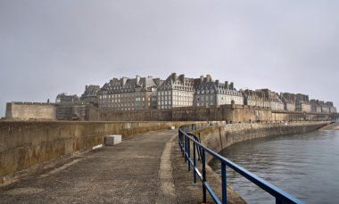 Saint malo in a foggy day clipart