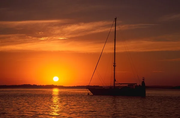 Yacht at sunset — Stock Photo, Image