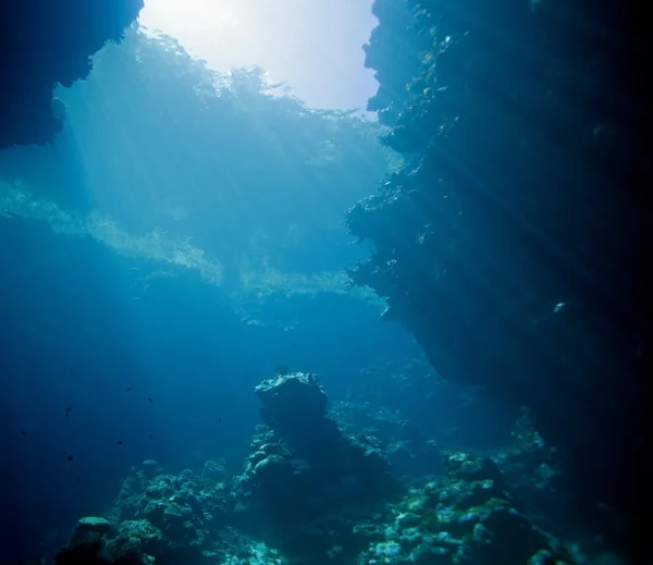 Sunbeams in a cave — Stock Photo, Image