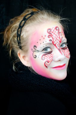 Beautiful smiling girl with face paint clipart