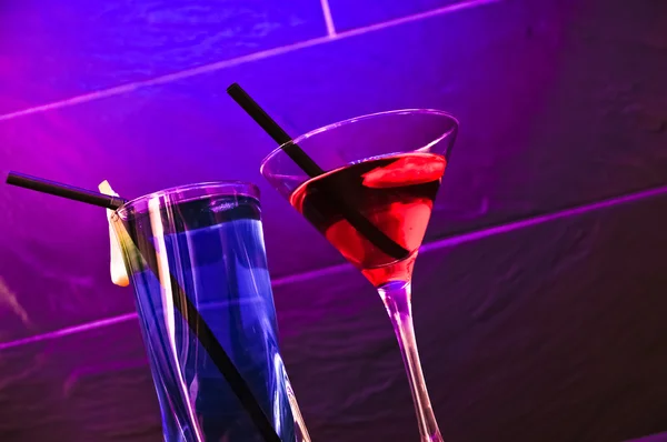 stock image A red cocktail and a blue longdrink