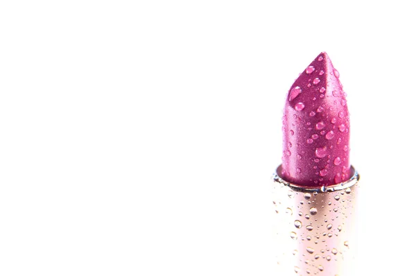 Różowa szminka fioletowy z kropelek wody — Zdjęcie stockowe