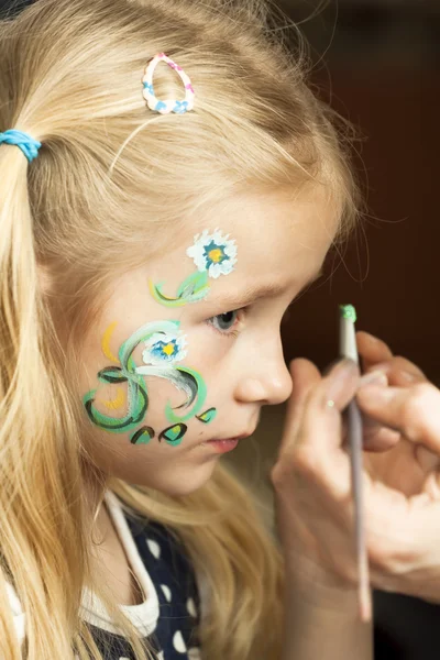 Criança com pintura facial. Maquiagem — Fotografia de Stock