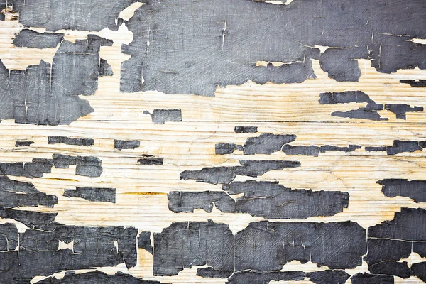 Altes Holz mit rissiger Farbe — Stockfoto